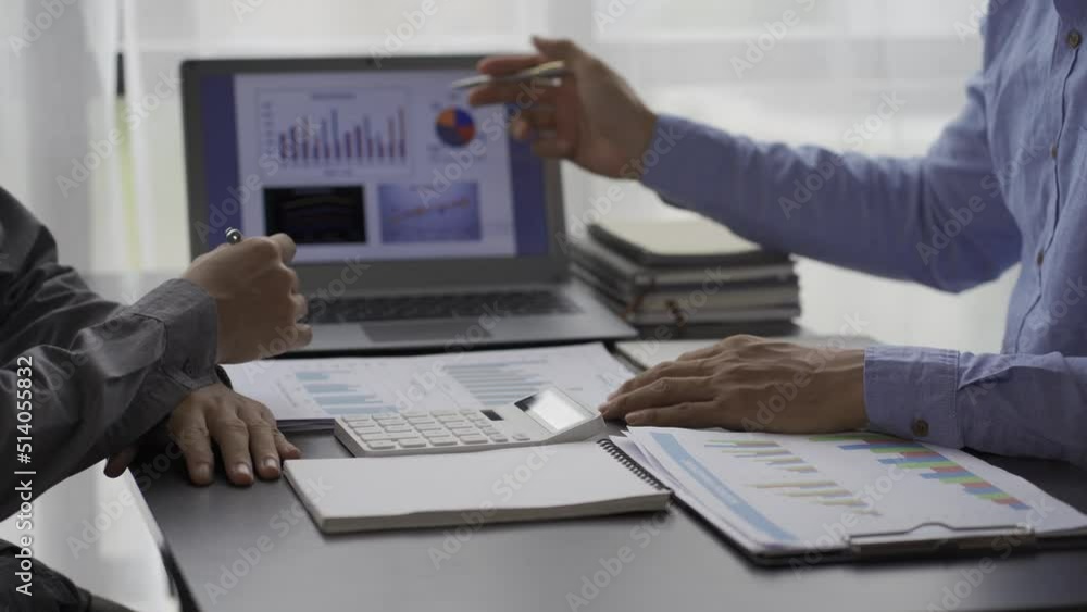 business colleagues analyzing financial documents at office business people teamwork and brainstorming planning financial report analysis business plan investment financial analysis concept business colleagues analyzing financial documents at office business people teamwork and brainstorming planning financial report analysis business plan investment financial analysis concept