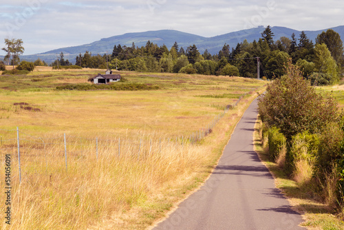 Old Building and Grass Field Along Olympic Discovery Trail in Sequim, WA