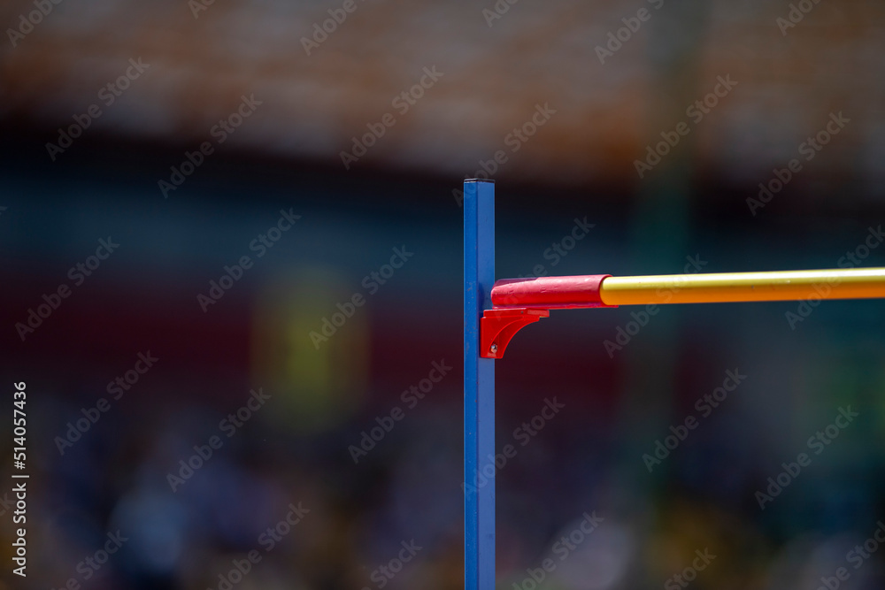 Фотография Hight jump competition crossbars on stadium background