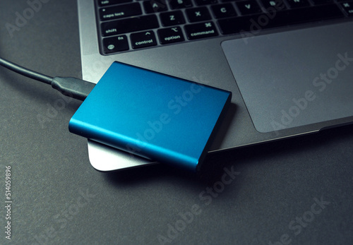 Storing information on an external ssd drive. Confidentiality of personal data. photo
