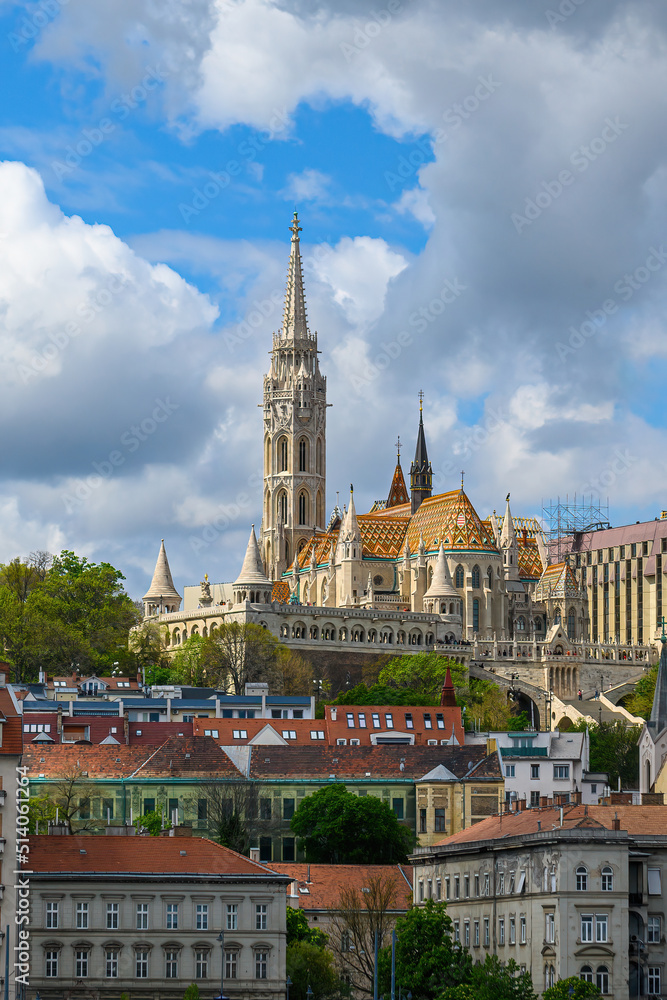 Matthias Church, a church located in Budapest, Hungary, in front of the Fisherman's Bastion at the heart of Buda's Castle District.