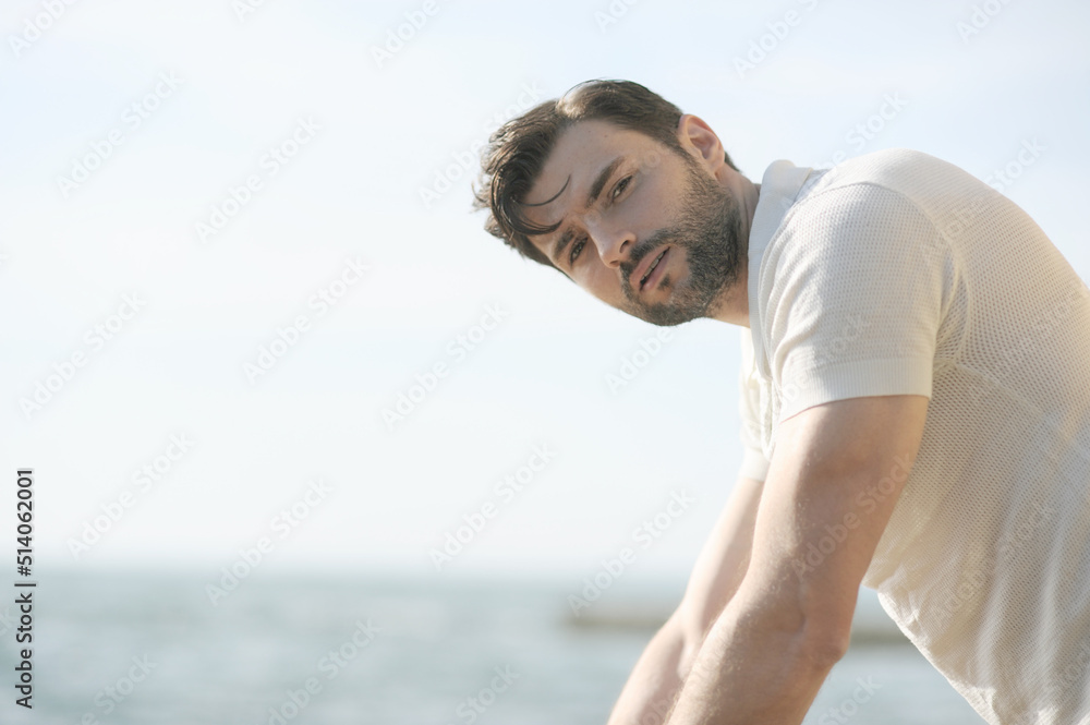 Young stylish man dressed in polo shirt