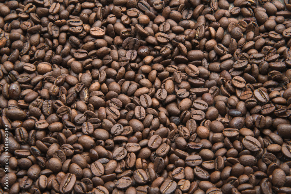 coffee beans on old wooden background