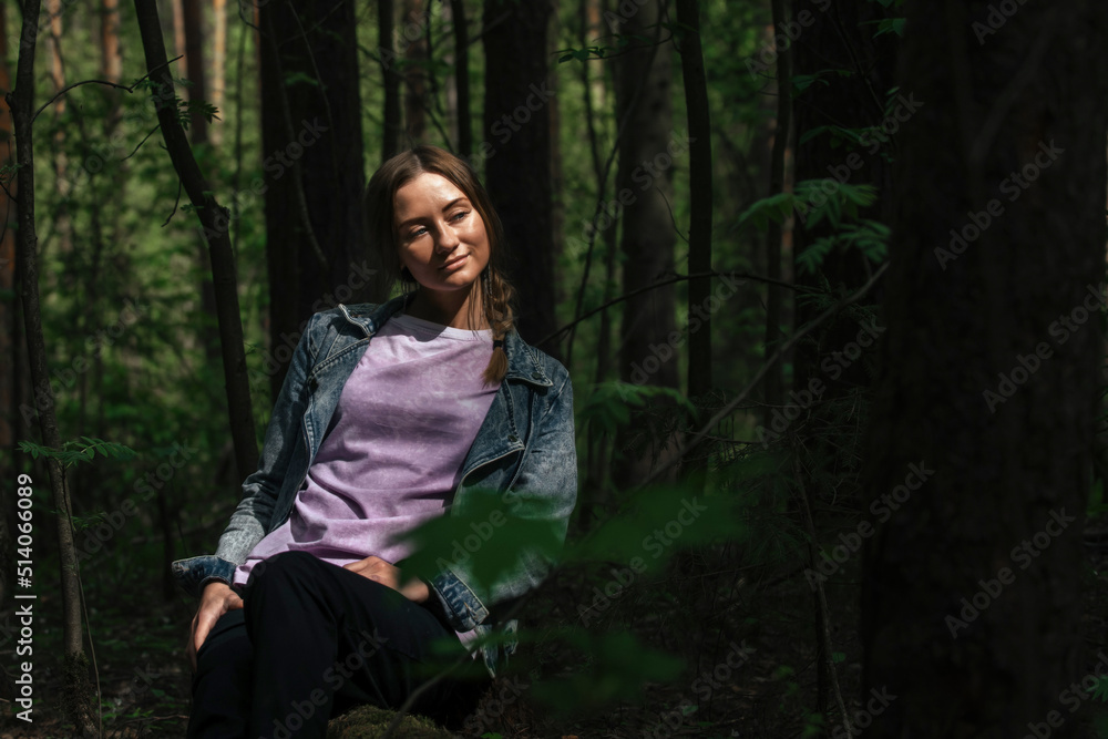portrait of a beautiful girl in the forest in the rays of the sun breaking through the trees portrait of a beautiful girl in the forest in the rays of the sun breaking through the trees