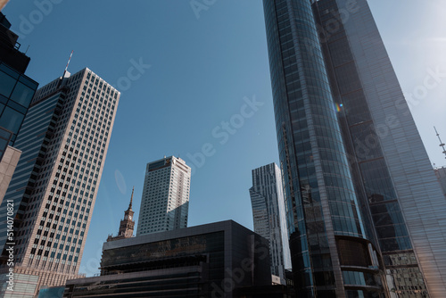 Urban modern city with glasses business and finance buildings with blue sky. Warszawa  Poland.