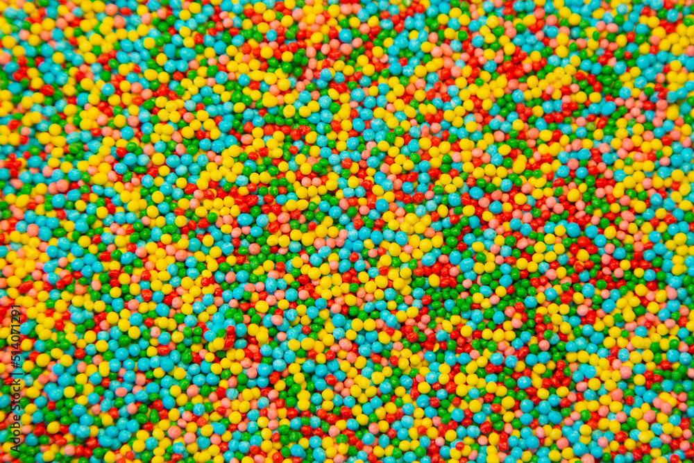 Abstract background. Top view on bright yellow, red, blue, green, orange round balls. Soft selective focus Abstract background. Top view on bright yellow, red, blue, green, orange round balls. Soft selective focus