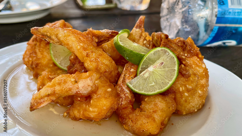 Batter fried sesame prawns with lime Batter fried sesame prawns with lime