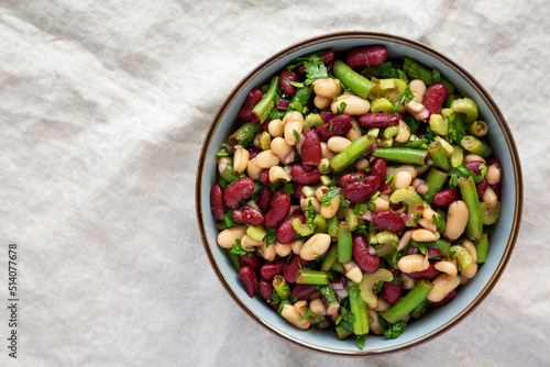 Homemade Three Bean Salad in a Bowl, top view. Flat lay, overhead, from above. Space for text.