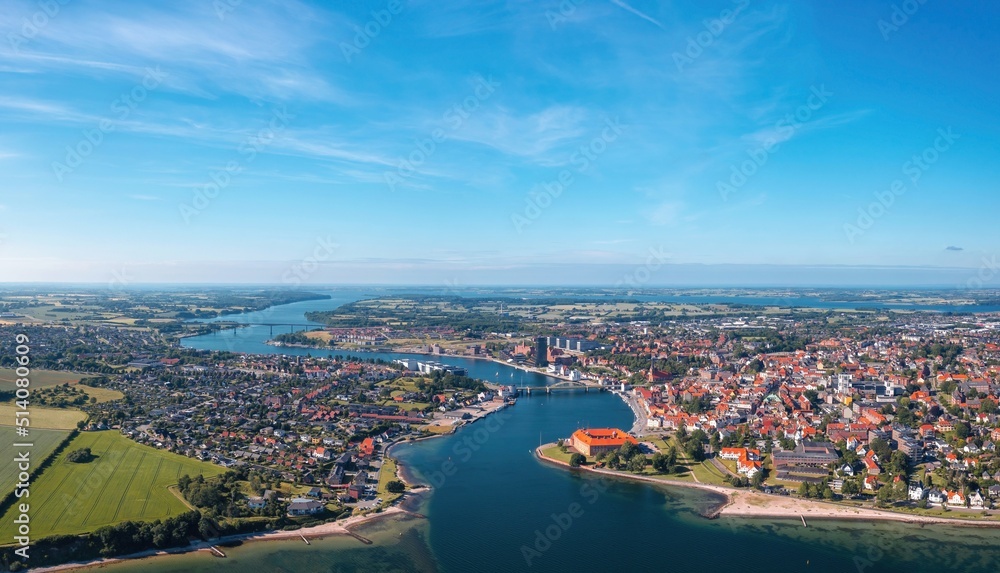 Sonderborg (Sønderborg, Denmark) skyline on sunny summer day. Wide aerial panorama