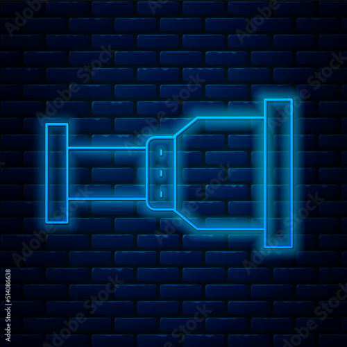 Glowing neon line Pipe adapter icon isolated on brick wall background. Plumbing pipeline parts of different shapes. Vector