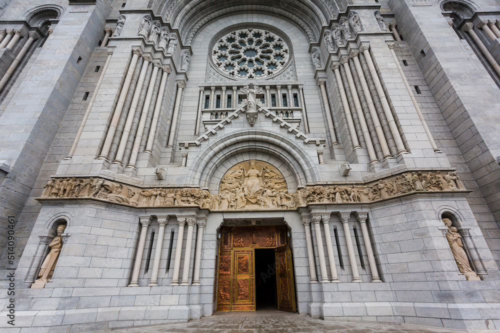 Majestic entrance of Basilica of Sainte-Anne-de-Beaupre, Cathedral, Quebec an important Catholic sanctuary, which receives about a half-million pilgrims each year. 