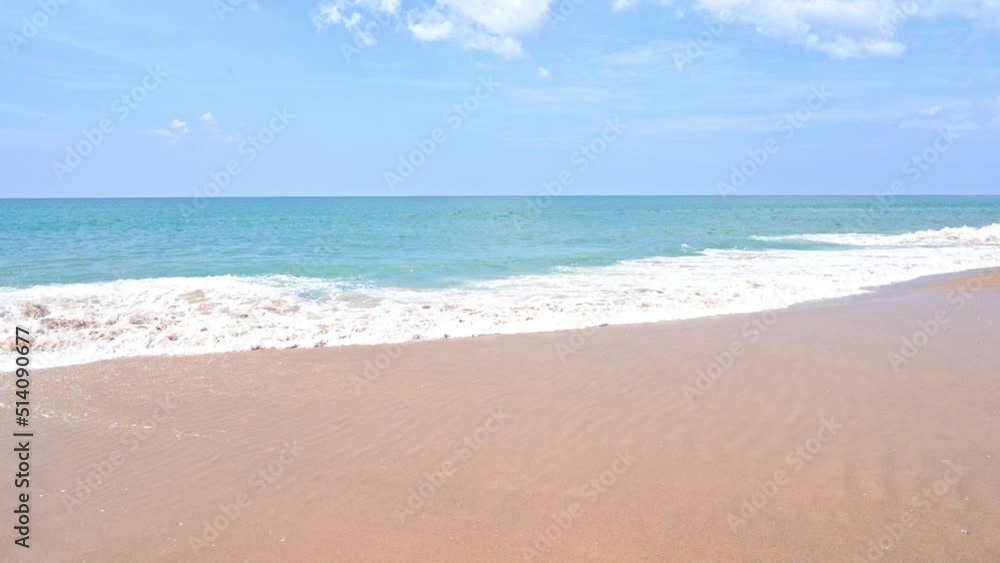 Slow Motion, Tropical Sea Waves Breaking on Sandy Beach on Hot Summer Day Slow Motion, Tropical Sea Waves Breaking on Sandy Beach on Hot Summer Day