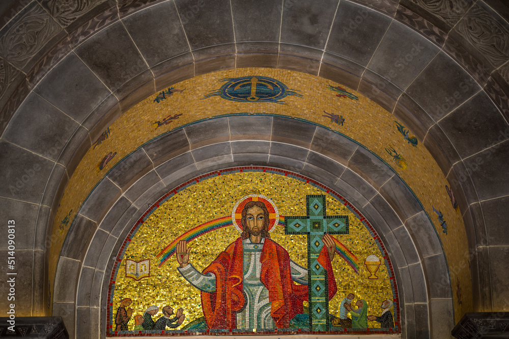 Stained glass window depicting Jesus blessing at Basilica of Sainte-Anne-de-Beaupre , Cathedral, Quebec an Catholic sanctuary. The shrine is known as a place of miracles even to this day.