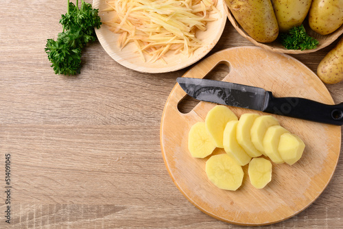 Sliced potatoes for cooking, Food ingredients, Table top view