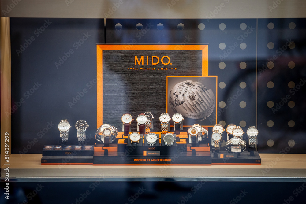 LJUBLJANA, SLOVENIA SEPTEMBER 15, 2021 Mido logo on a jewelry boutique with watches of the