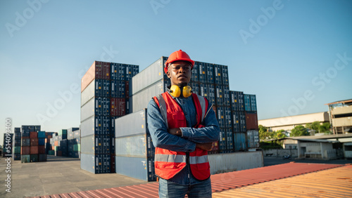 Young Asian man in vest and...
