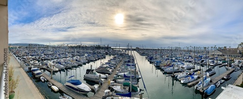 Panoramic view of the marina with yachts and private sailboats in King harbor at Redondo Beach, California