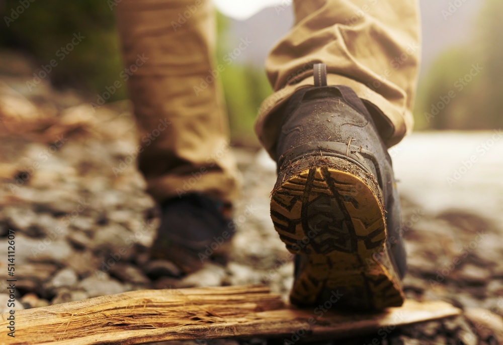 close up of a boots on a wood close up of a boots on a wood