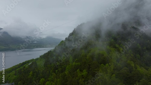 Morning fog over mountain in Romsdals fjord, Norway 