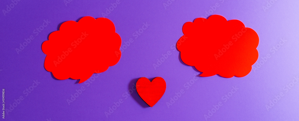 Red clouds,heart for Valentine's day concept.Communication red heart between two clouds. Purple,veri peri background.Place for your text. Copy space.Banner.