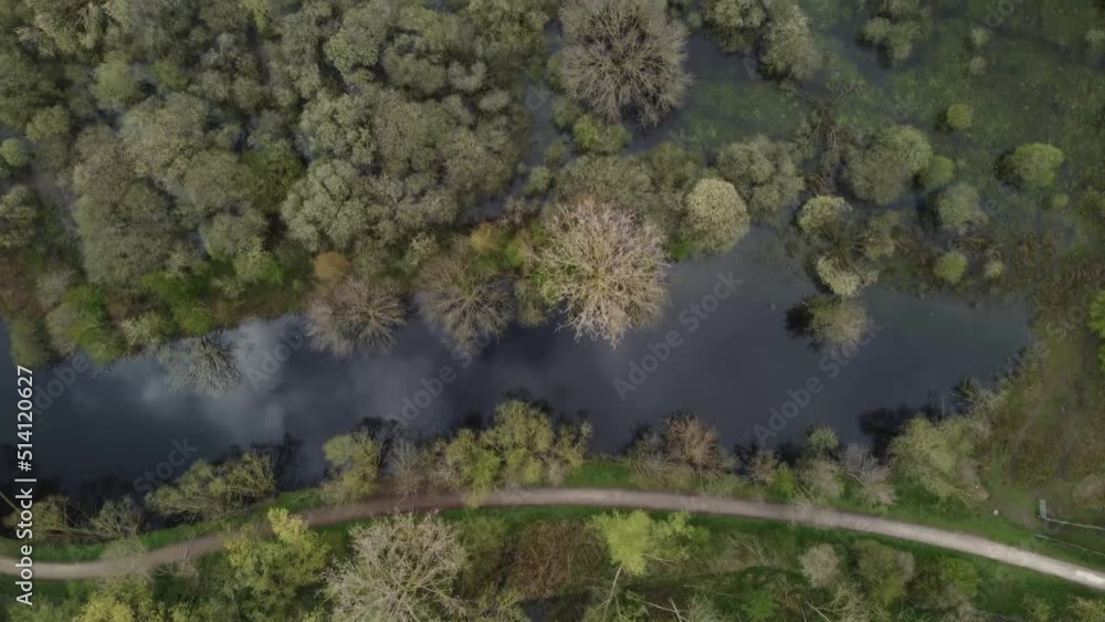 Bird's eye view over the valley of the Schelde showing woods and beautifull waterreflection Bird's eye view over the valley of the Schelde showing woods and beautifull waterreflection