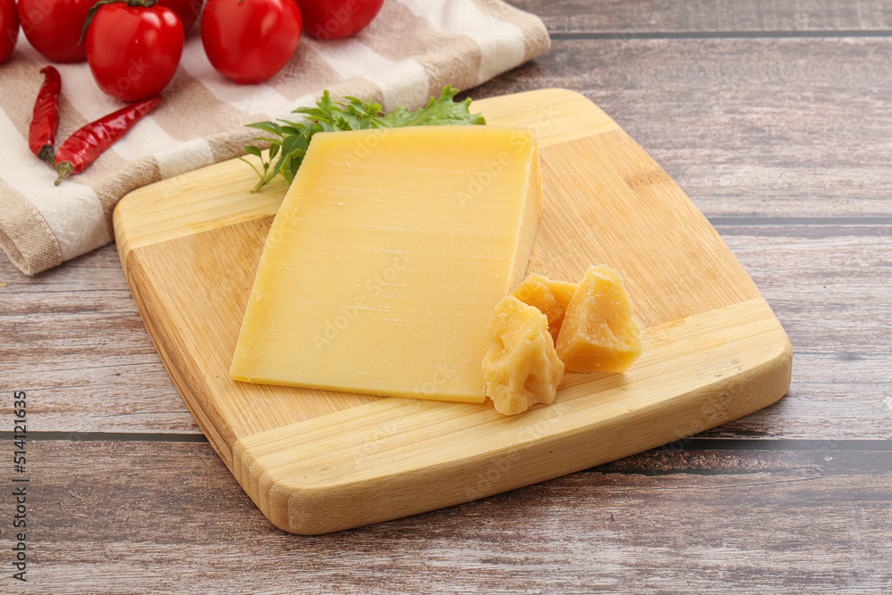 Parmesan hard cheese with small pieces Parmesan hard cheese with small pieces