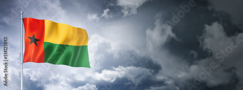 Photos Guinea Bissau flag on a cloudy sky