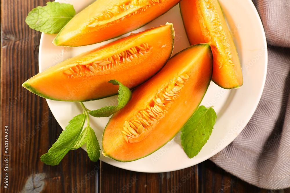 fresh melon slices on plate fresh melon slices on plate