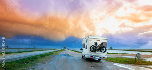 motor home- campervan caravan vehicle on the road © M.studio