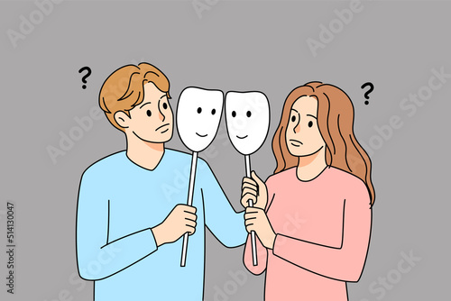 Couple with masks in fake relationships