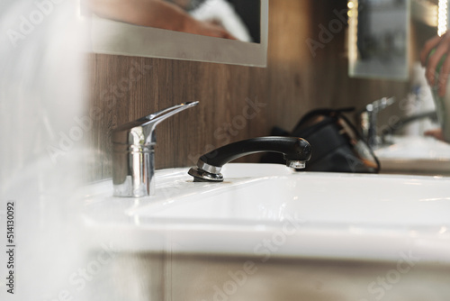 Workplace with a washbasin in barbershop close up