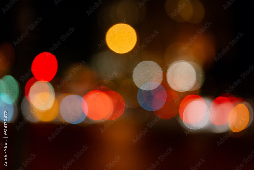 Bokeh traffic light at night in the street of a big city for background Bokeh traffic light at night in the street of a big city for background