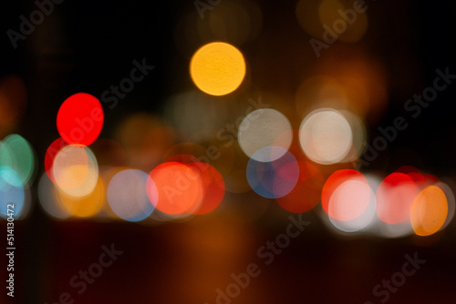 Bokeh traffic light at night in the street of a big city for background © fotofabrika
