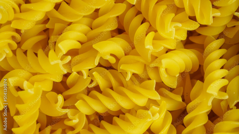 pasta in a dish dry appetizing spiral macaroni in the kitchen food preparation pasta in a dish dry appetizing spiral macaroni in the kitchen food preparation