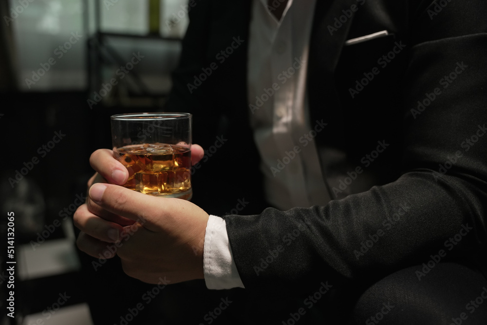 Businessmen in suits drinking whiskey Businessmen in suits drinking whiskey