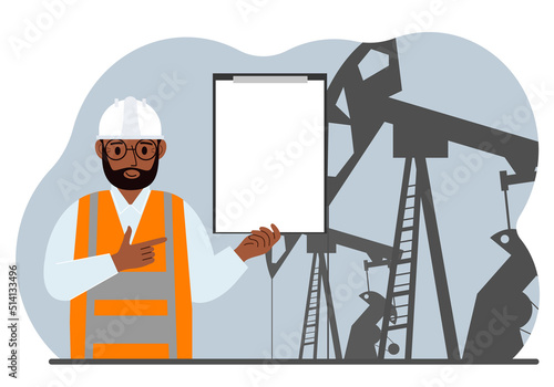 A male refinery engineer worker uses a tableted oil pumping unit. Energy industrial zone, oil drilling.