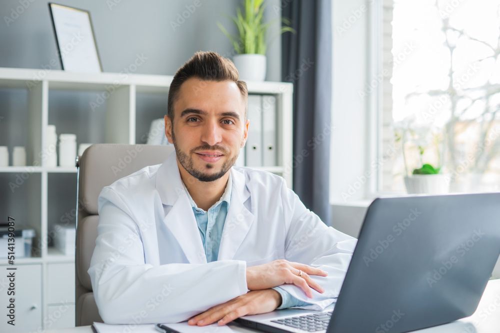 Doctor Works in the Medical Office. Workplace of a Professional Therapist in a Hospital or Clinic. The Concept of Healthcare and Medicine. Doctor Works in the Medical Office. Workplace of a Professional Therapist in a Hospital or Clinic. The Concept of Healthcare and Medicine.