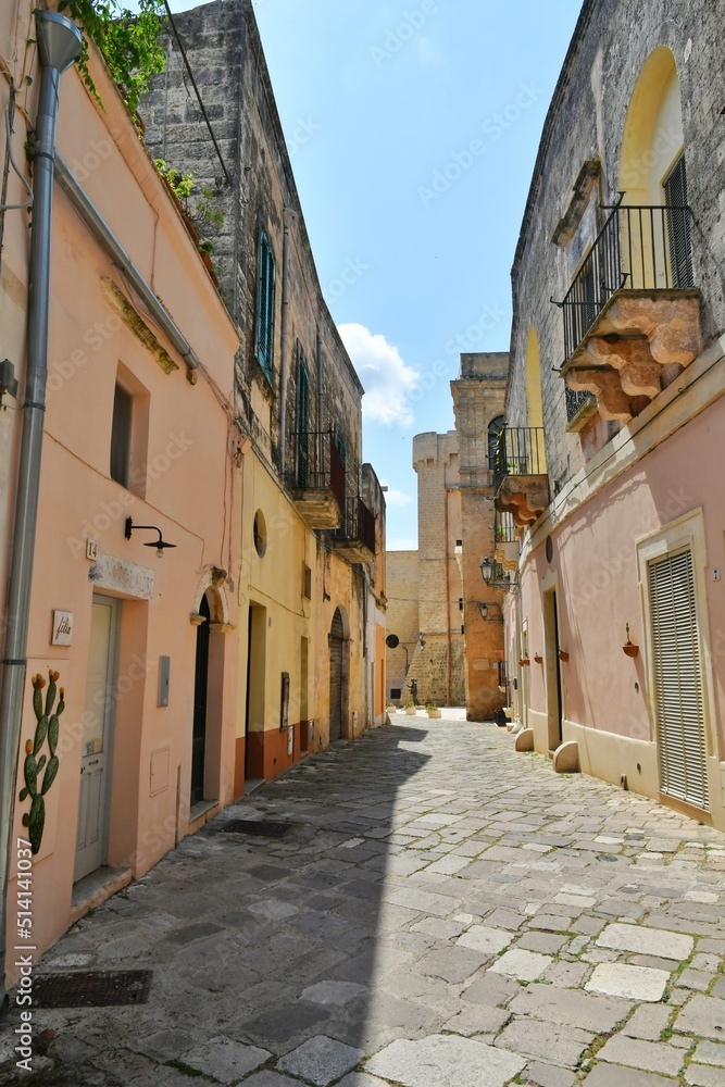 Fototapeta premium A street in the historic center of Tricase, a medieval town in the Puglia region, Italy.