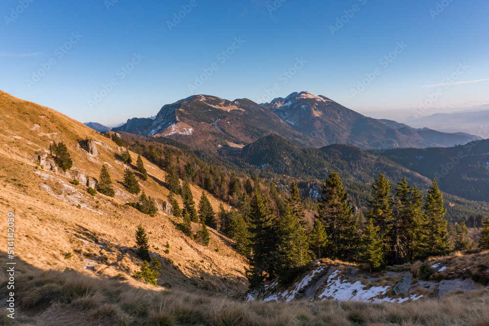 Man running cross country over the hills.