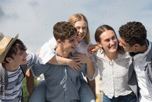 Closeup of happy teenagers having fun together.
