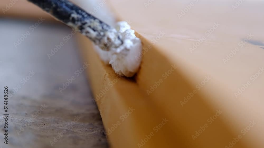 Gluing foam from a gun layers of foam insulation. Laying of underfloor heating, installation of