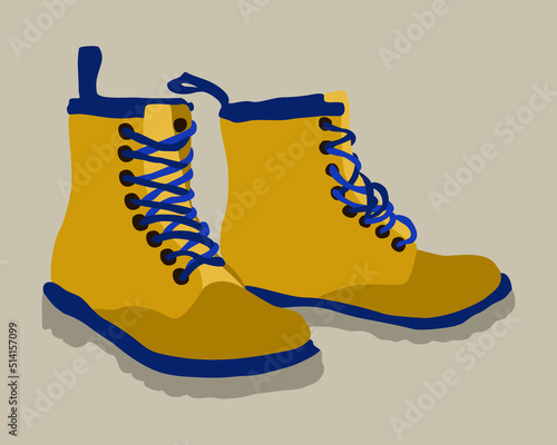 Vector illustration of bright yellow travel boots with blue details and lacing on beige background.