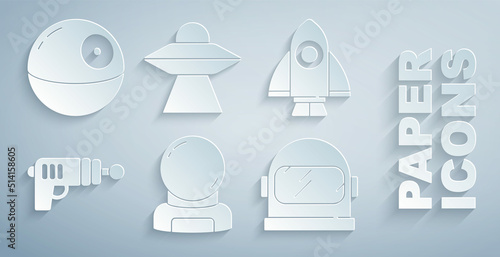 Set Astronaut helmet, Rocket ship, Ray gun, UFO flying spaceship and Death star icon. Vector