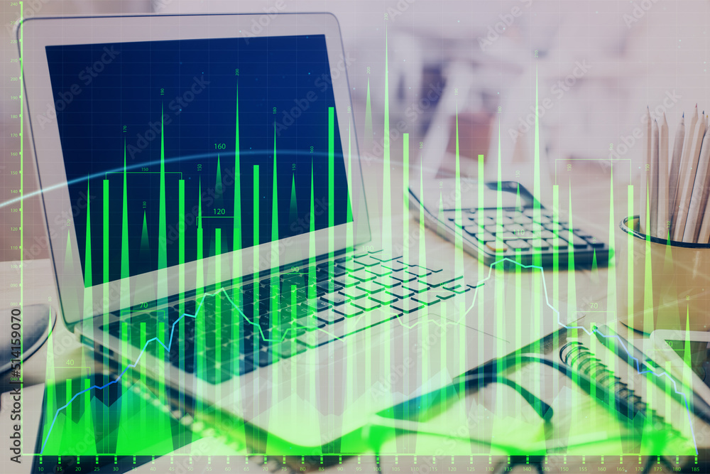 Forex market chart hologram and personal computer background. Double exposure. Concept of investment. Forex market chart hologram and personal computer background. Double exposure. Concept of investment.