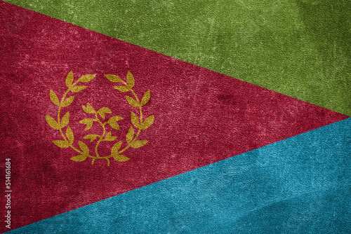 Old leather shabby background in colors of national flag. Eritrea