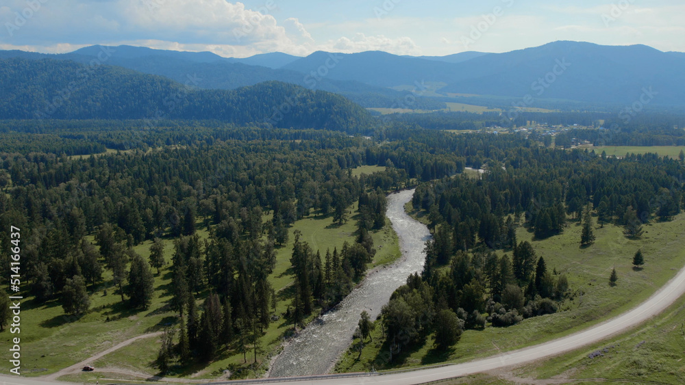 River in valley of Altai and deep forest
