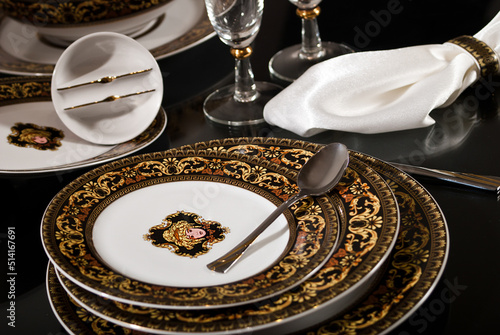 Photography Luxury and elegant porcelain dinner set with a classy golden design