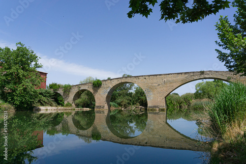 Landscape of the Cabrianes bridge with the reflection in the Llobregat river on a sunny day photo