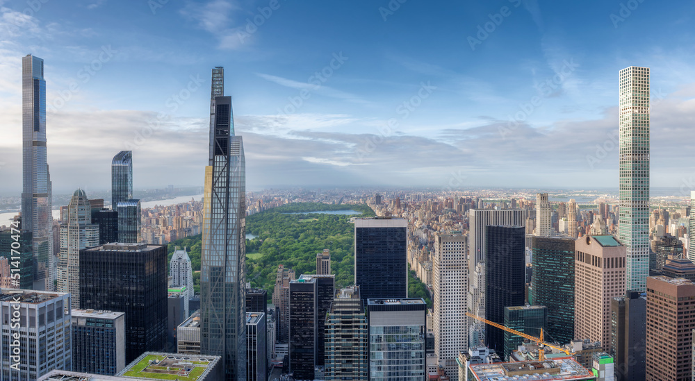 The New York City skyline and the Central Park and skyscraper aerial at sunset, Manhattan, NY, USA