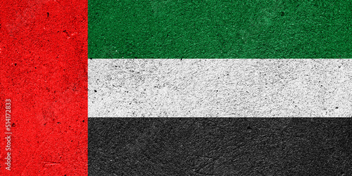 Flag of United Arab Emirates on a plastered wall
